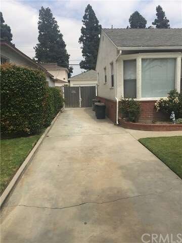 Long driveway for ample parking leading to two car