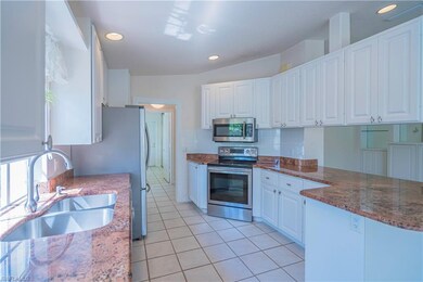 Gorgeous Granite Counters and Stainless Sink and F