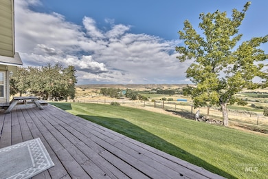 Wooden deck featuring a view of countryside