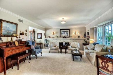 Another view of the formal living room, which lead