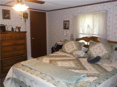 Large master bedroom with walk in closet and private bath.