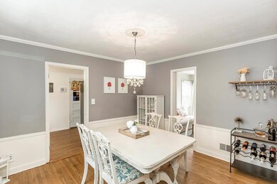 The dining room connects the eat-in kitchen, livin
