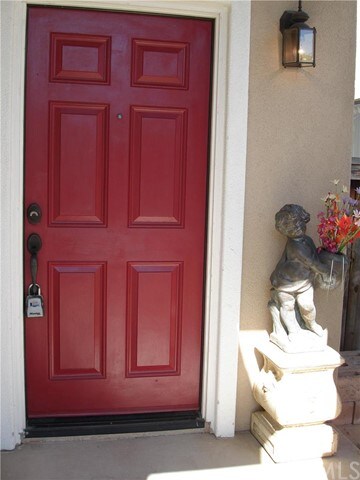 COVERED ENTRY DOOR INTO A FOYER