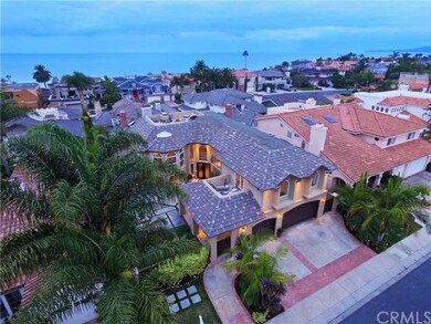 Drone view of home and nearby beach/ocean
