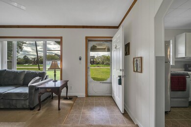 06-11799 W Jolly Rd-WindowStill-Rea