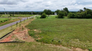 View of yard with a rural view