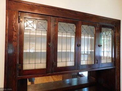 It too boasts original leaded glass doors!