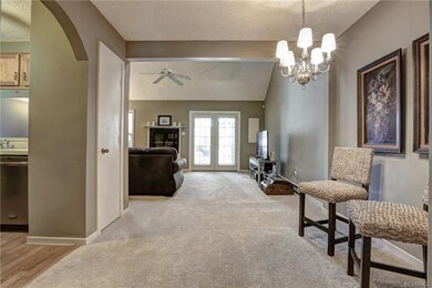 Open Concept - Chandelier crowned dining area