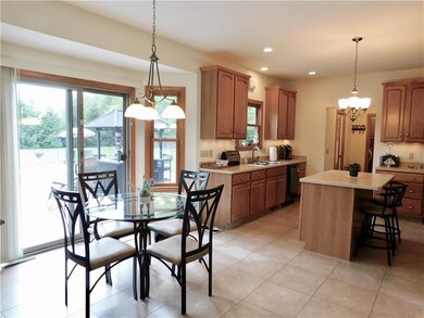 Kitchen Dinette area with back door view to pool