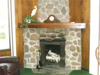 Living Room Corner fieldstone fireplace
