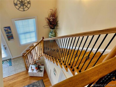 Custom stair rails leading up to the second level.