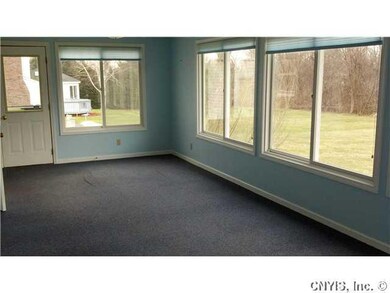Porch - Enclosed. Sunroom offers a four-season vie