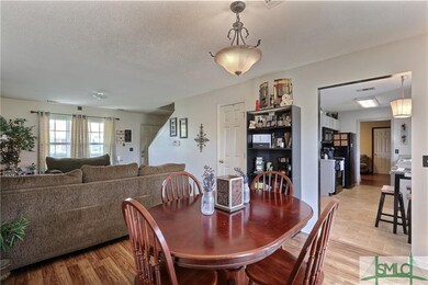 Dining area open to living room