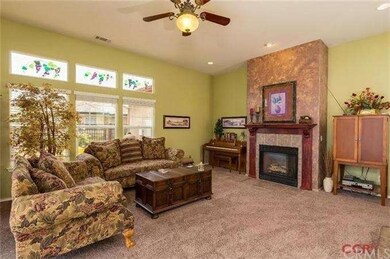 Welcoming conversation area near the fireplace in 