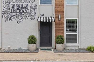 Doorway to property with brick siding