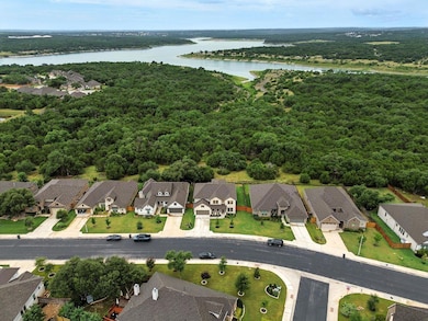 Aerial view of residential area with a nearby bod