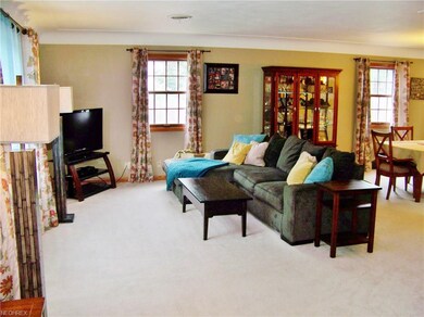Formal living room with wide, curved crown molding