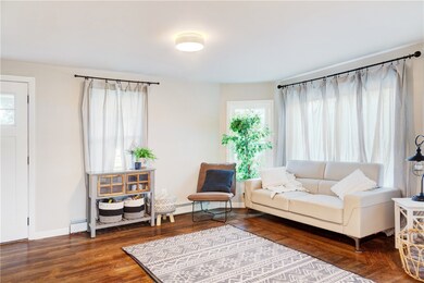 Living room, hardwood floors throughout
