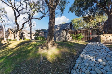 View of yard featuring fence