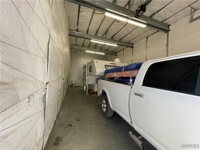 50 feet deep garage with 13 foot RV door