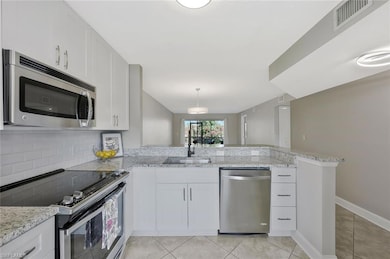 1211 Rosemary Ct unit 104, Naples, FL 34103 - photo 4