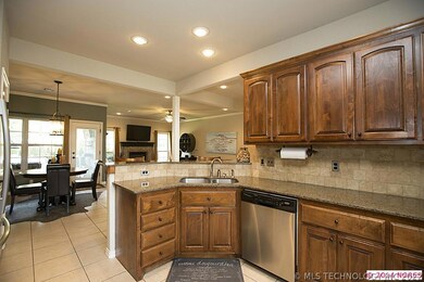 Kitchen opens to family Rm w breakfast nook off ki