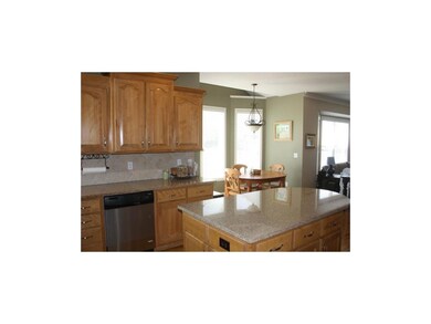 Spacious kitchen with adjoining eating area