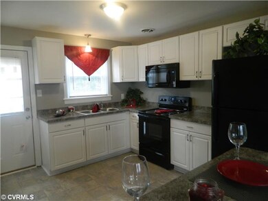 Kitchen - Completely Remodeled Kitchen!  New Floor, Cabinets, Countertops, and Appliances!