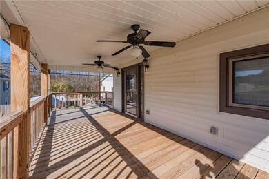 The large, inviting porch comes complete with fans