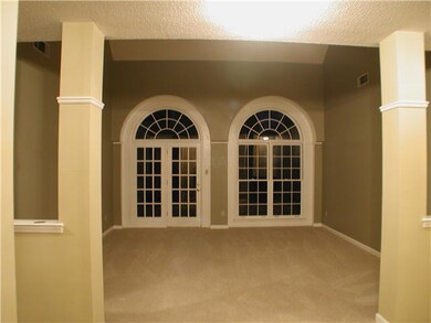 Formal Living Room With All New Carpet and Fresh P
