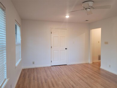 Unfurnished room with light wood finished floors 