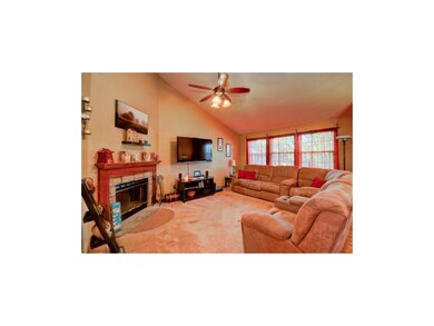 Living Room With Vaulted Ceiling and Lots of Light