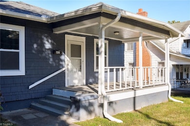 Large covered front porch just waiting for your rocking chairs!