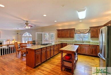 KITCHEN OVERLOOKING BREAKFAST AREA & FAMILY ROOM W