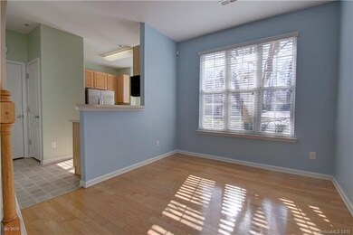DINING ROOM: The decorative archway leads to the s