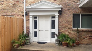 View of the front door to unit