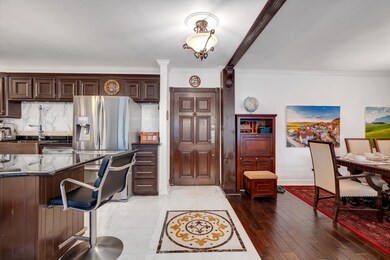 Front entry showcasing custom marble tile work