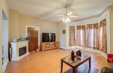 Living room featuring light hardwood / wood-style