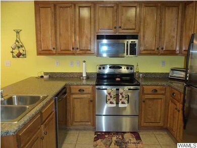 Ample cabinet space in the kitchen, which features