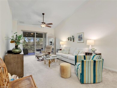 Lliving room featuring vaulted ceiling