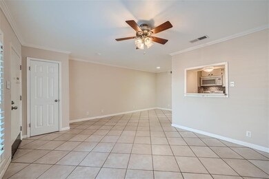 Unfurnished room with crown molding and ceiling f