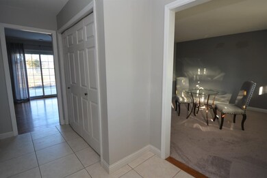 Entryway showing the dining room to the right with