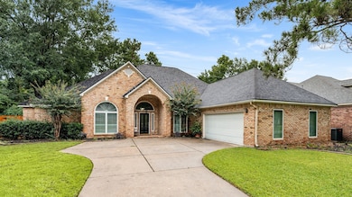 This home features a charming brick facade with an