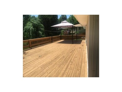 Seriously big deck with wrought metal gazebo -- di