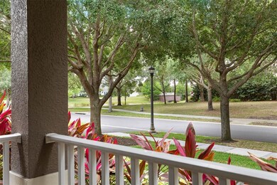 Covered porch with view of pond and quiet park are
