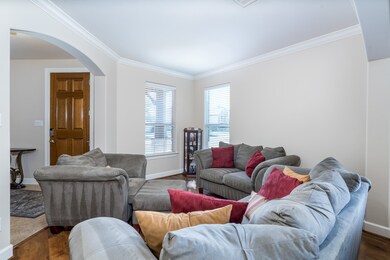 The formal living area adjoins the formal dining room and provides lots of space to entertain.  Something to think about with the holidays coming up!