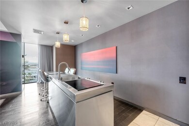 Kitchen featuring visible vents, hanging light fix