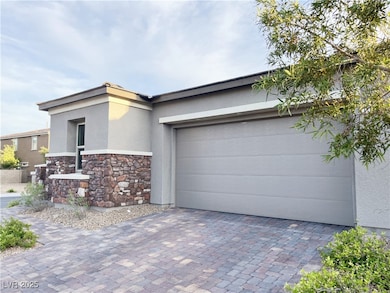 View of front of house featuring stucco siding, st