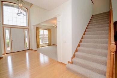 Two story foyer with afternoon sun.
