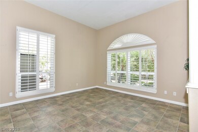 FORMAL LIVING ROOM WITH CUSTOM SHUTTERS